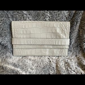 Coach alligator embossed clutch. Real leather